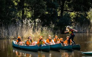 kids canoeing at Cave Hill Creek