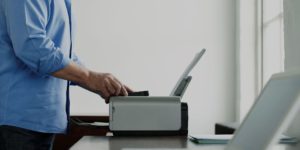 man using printer