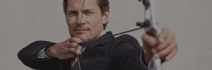 man shooting arrow