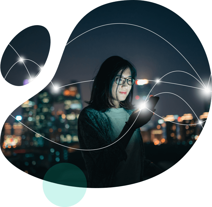 woman using mobile at night